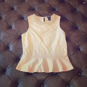 Peplum top with color detail